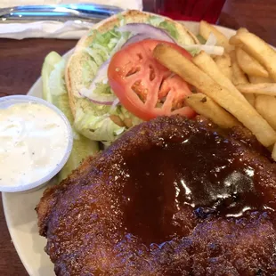 Legacy Pub Chicken Sandwich with fries. The special sauce is honey-Worcestershire-ish.