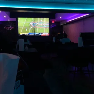 people watching a game on tv