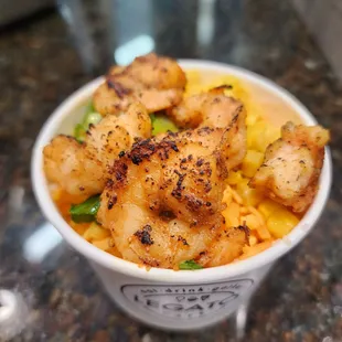 a bowl of shrimp and rice