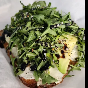 a sandwich with avocado and cheese