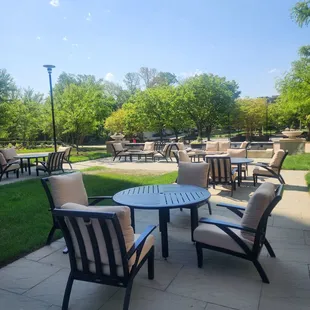 outdoor seating area with tables and chairs