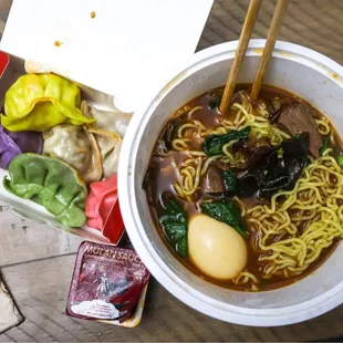 Ramen with Hell soup base and beef, Mix Soup Dumplings (6), and Mulan sauce.
