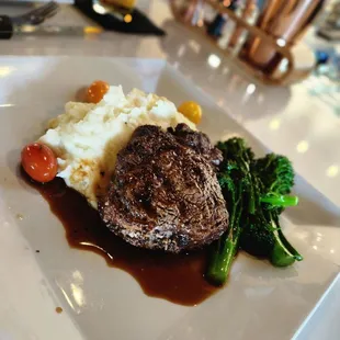 Filet with mashed potatoes and brocolini.