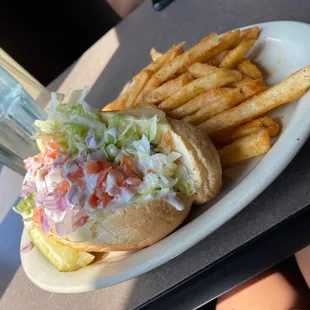 a sandwich and fries on a plate