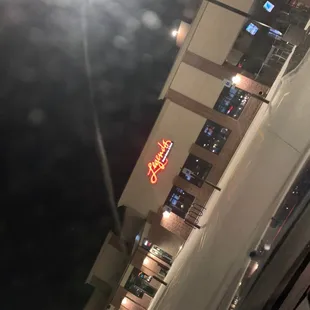 the neon sign of a hotel