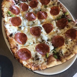 Pub pizza. Crisp crust and sweet savory sauce.