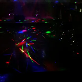 a disco scene with neon lights