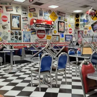 Chairs put away two hours before closing.