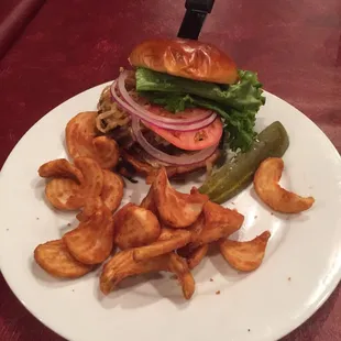 Legend Burger : mixture elk and buffalo, not a gamey taste in sight, cooked medium. Fries.. Also tasty