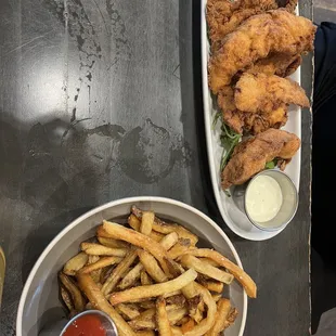 Chicken tenders with a side of fries 10/10