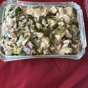 Gyro over rice with Cilantro and white sauce