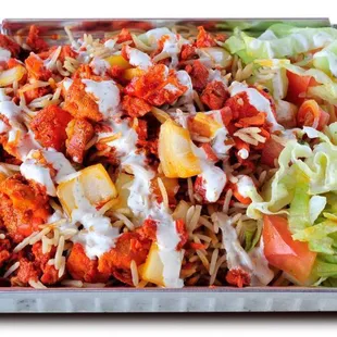 Chicken over rice. (Sauce options, white sauce, spicy white, cilantro, hot sauce, BBQ sauce.)