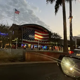 Front of the place. Awesome huge flag USA