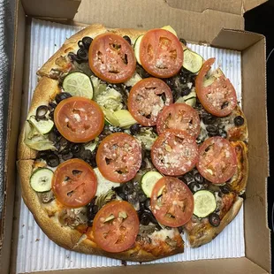 The Vegetarian Pizza- minus onion or bell pepper - added artichoke