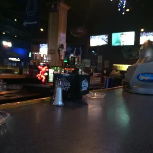 a glass of beer on the bar