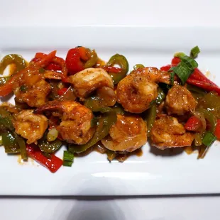a plate of shrimp and peppers