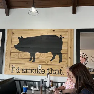 a woman sitting at a table