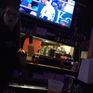 a woman at the bar
