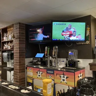 the bar and televisions