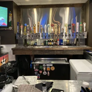 a bar with beer taps