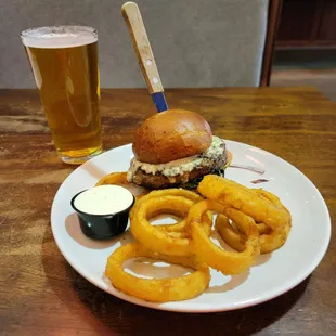 Black and blue burger with onion rings and a Belching Beaver IPA.