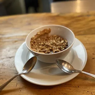 a bowl of oatmeal and a spoon