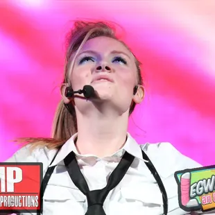 a woman with a microphone