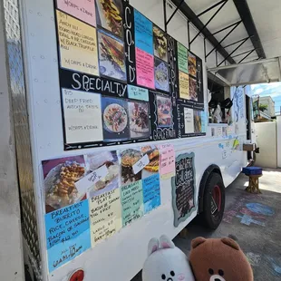 Picture menu on the side of the Food Truck