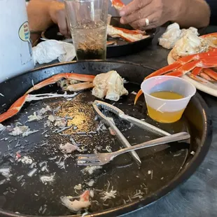 ws a man eating crab legs