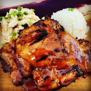 Huli Huli Chicken, our families, slow turned and char-grilled version of Teriyaki done right!