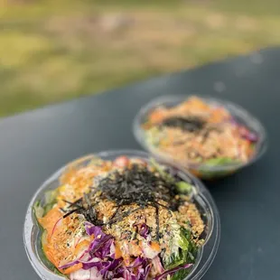 two bowls of food on a table