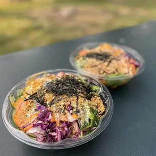 two bowls of food on a table