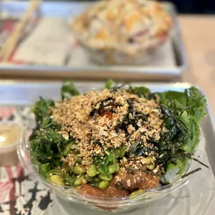 a bowl of broccoli and a bowl of rice