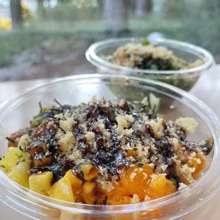 two bowls of food on a table