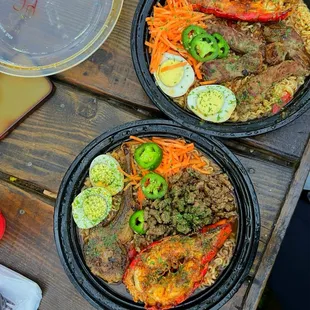 two bowls of ramen and vegetables