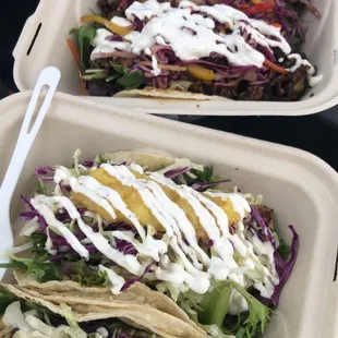 Jerk chicken and fish tacos