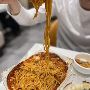 baked spaghetti with meat sauce and cheese