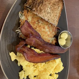 Eggs, bacon, hash brown, and toast