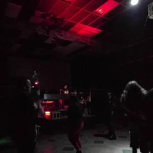 a group of people playing basketball