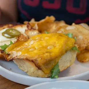 Egg &amp; cheese (made vegetarian, default with sausage).