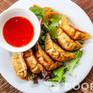 a plate of asian food