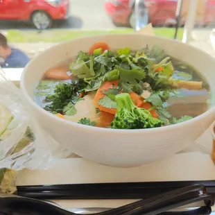 Beef broth pho with tofu and veggies with a side of fish sauce