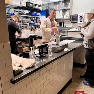 I presume the owner at the counter