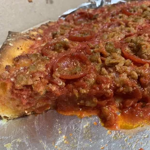 Pepperoni and sausage deep dish pizza