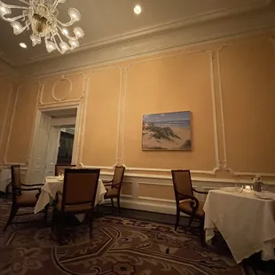 a dining room with a chandelier