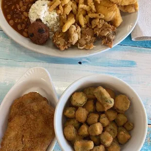 Crab cakes, okra and full net seafood platter.