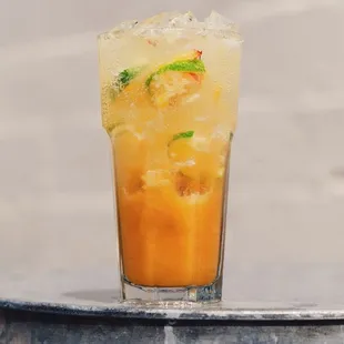 a drink in a tall glass