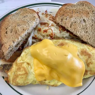 Lake Perch and Cheese Omelette with Has Browns