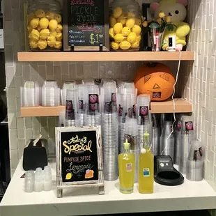 a shelf of lemons and juices