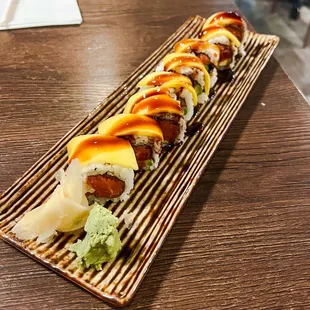 a long rectangular plate of sushi
